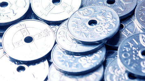 Bildet viser norske 1-kronemynter