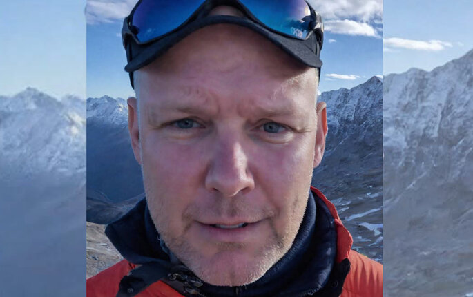 Bildet viser et portrett av Hallgeir Landstad