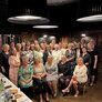 Bildet visser festkomiteen og deltakerne som møtte til jubileumsfeiring