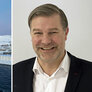 bildet viser medisinsk direktør og sykehuset i Hammerfest