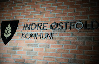 Bildet viser kommunelogo Indre Østfold kommune.