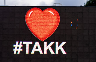 Illustrasjonsbilde: Et stort hjerte med teksten «#Takk» under.