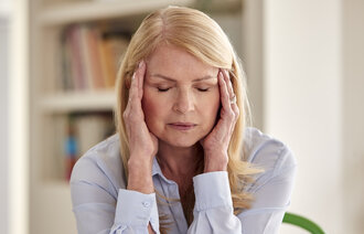 Kvinne med hodepine Kvinne med hodepine