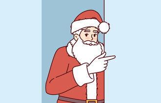 Bildet viser en julenisse som peker.