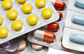 Bilde av fargerike piller