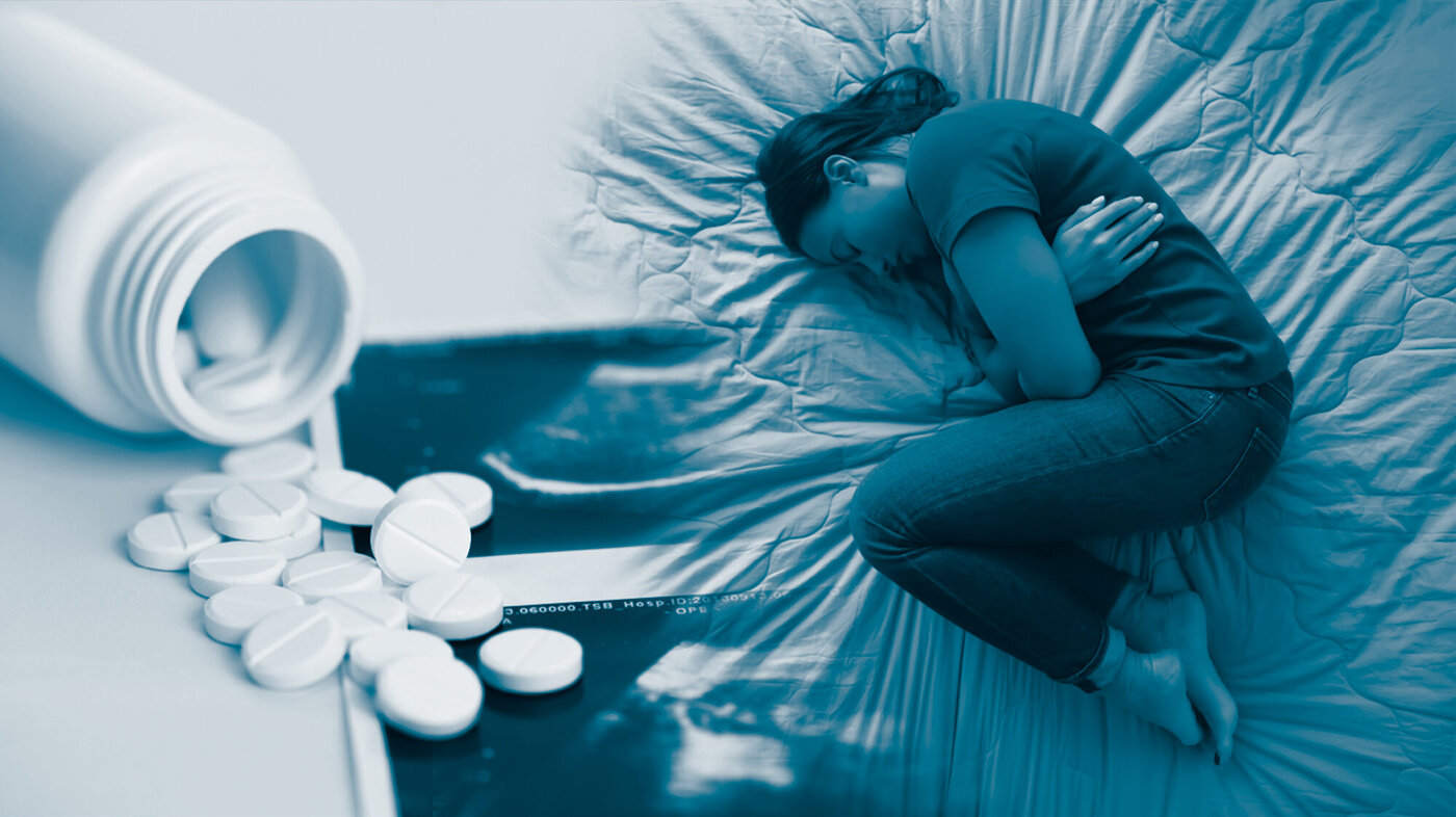 The photo montage shows a glass of tablets and a woman lying in a fetal position in her bed