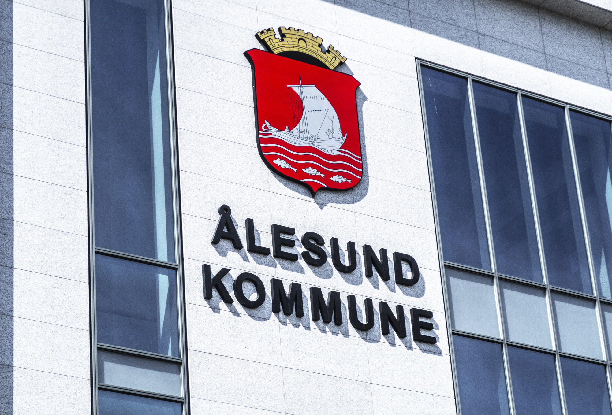 Bildet av et skilt med Ålesund kommune