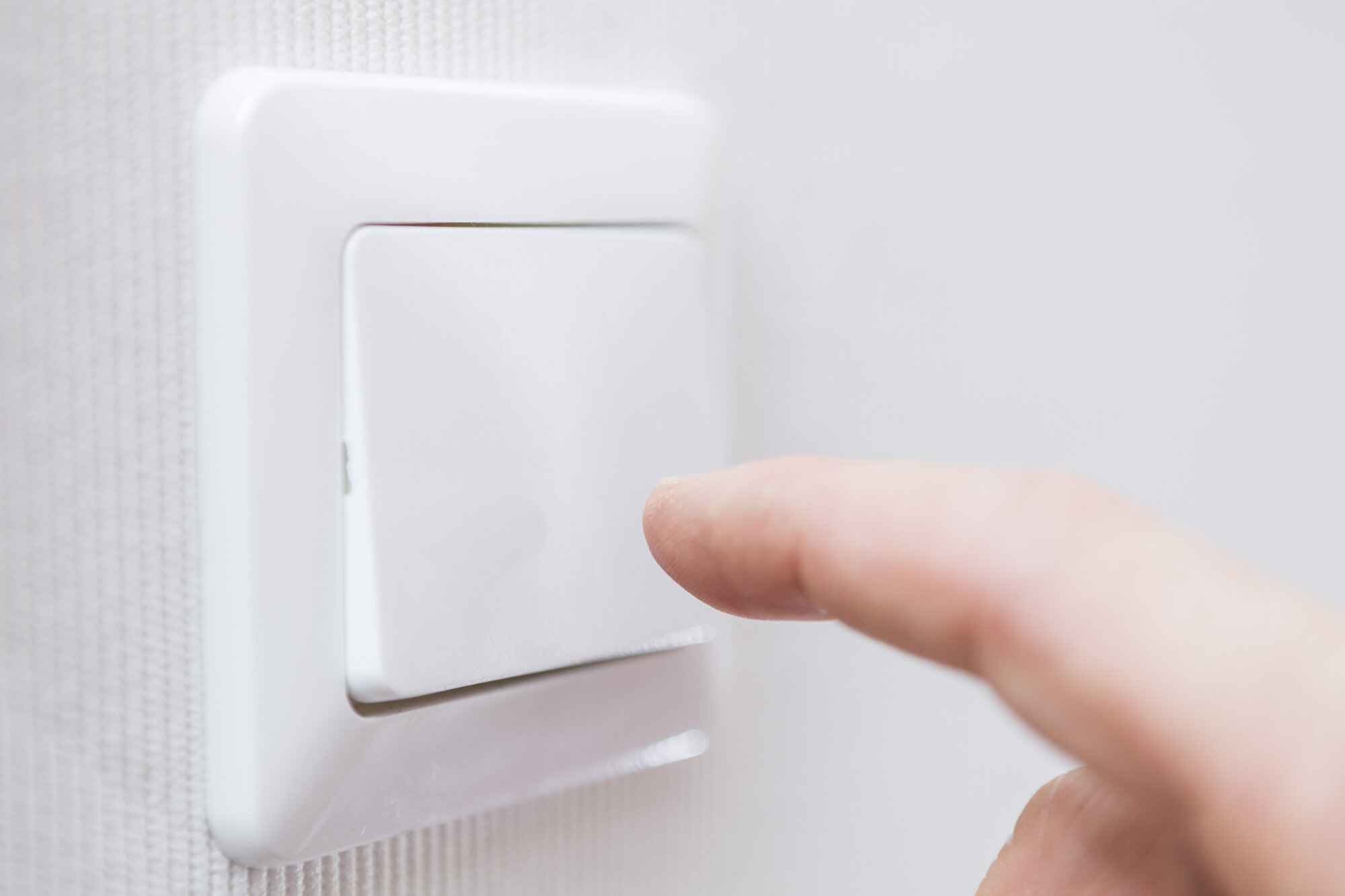 Bildet viser en lysbryter.