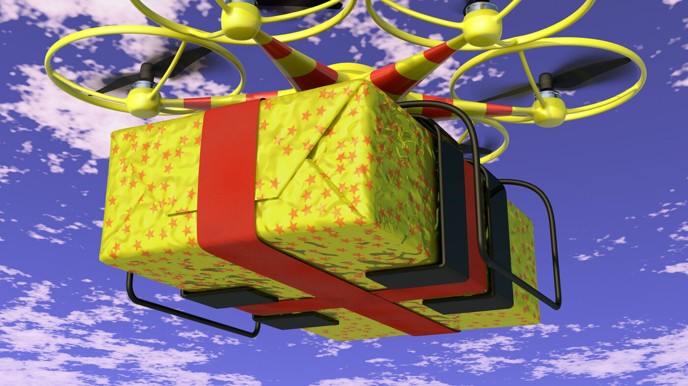 Bilde av julepresang som flyr som en drone.