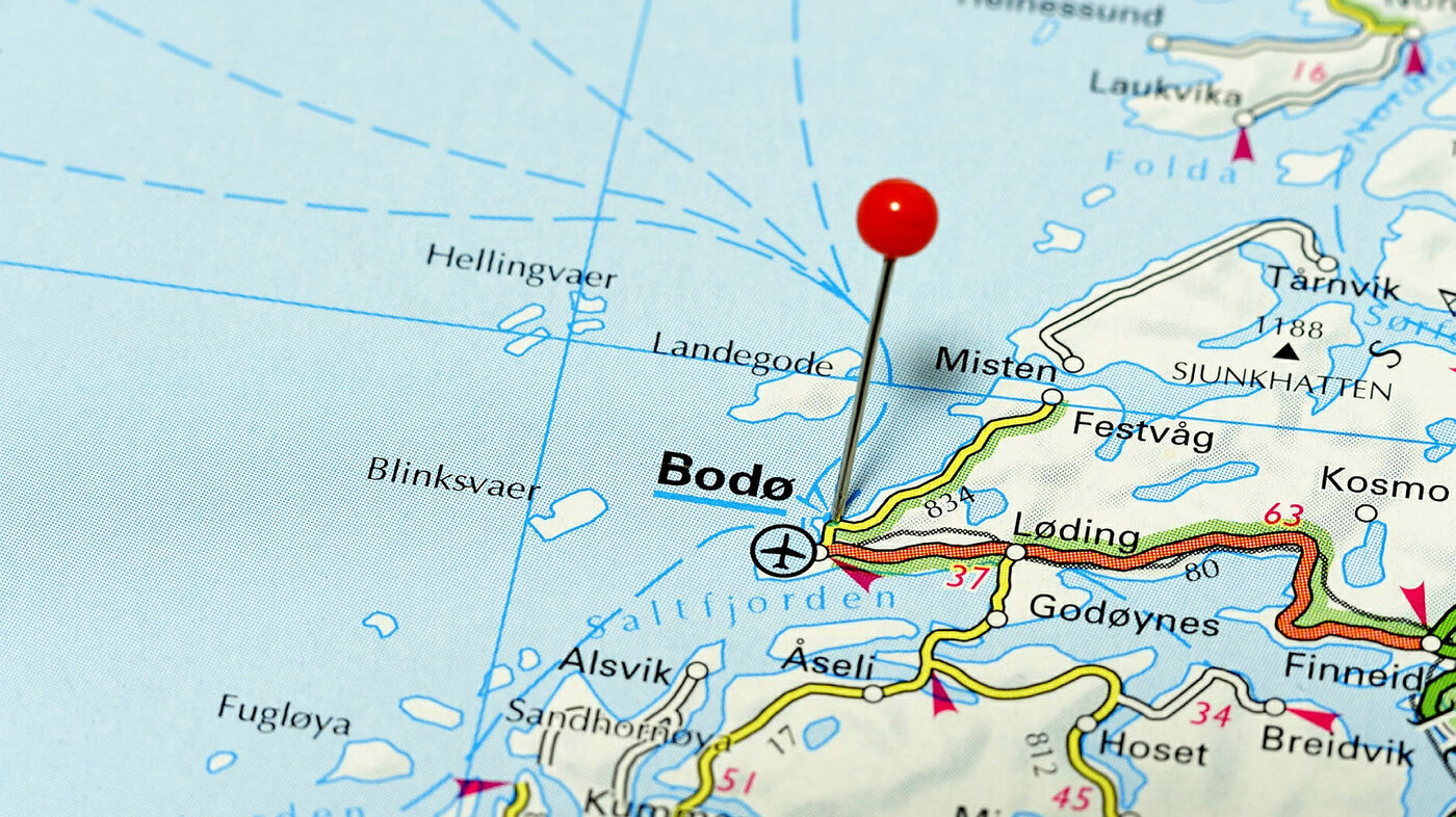 Nærbilde av norgeskart som viser Bodø markert med en råd nål