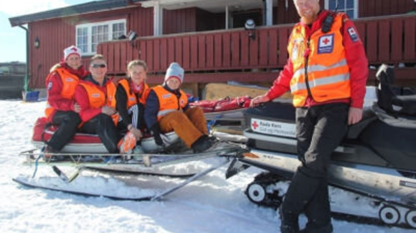 Familien Blakkestad på en scooter