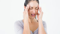 Kvinne med migrene